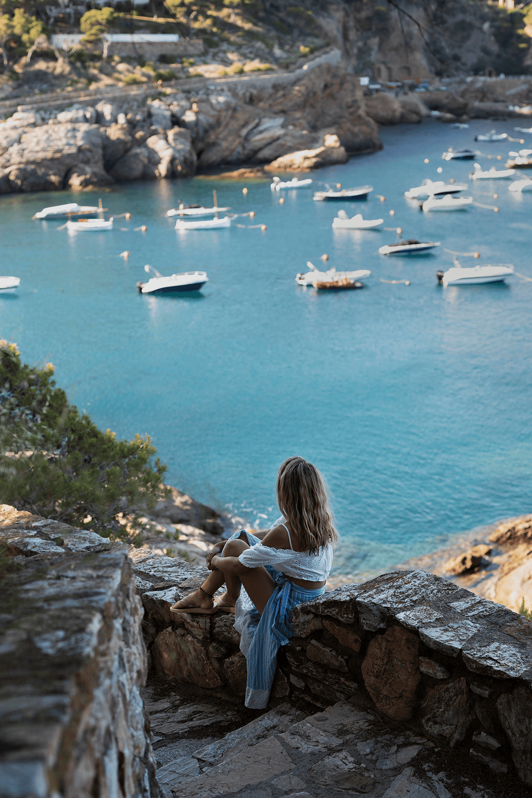 full-shot-woman-looking-boats